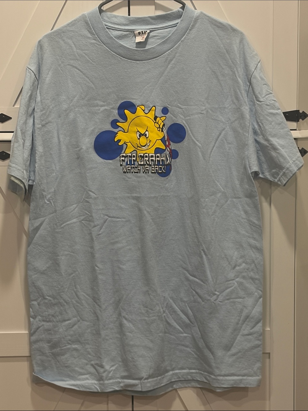 FTP Light Blue Tee with Yellow Sun Graphic
